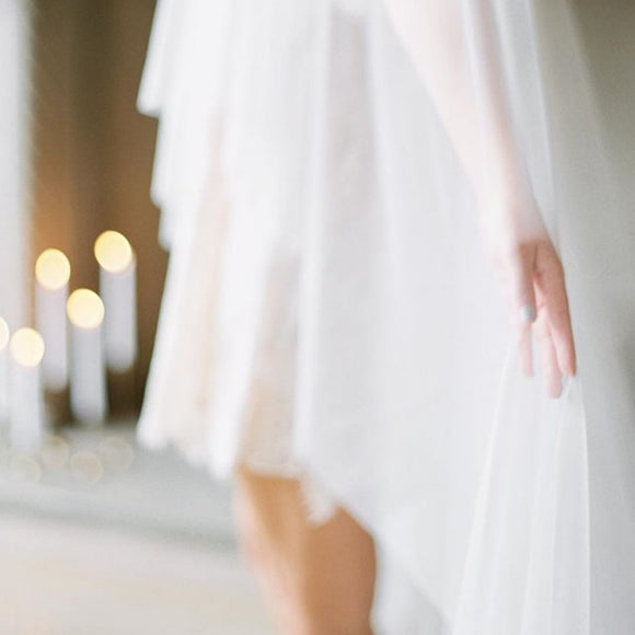 raw edge cathedral veil in ivory with candles