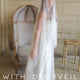 cathedral length ivory raw edge veil with drop veil blusher