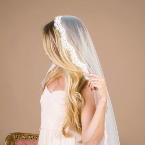 Cathedral length mantilla wedding veil with beading