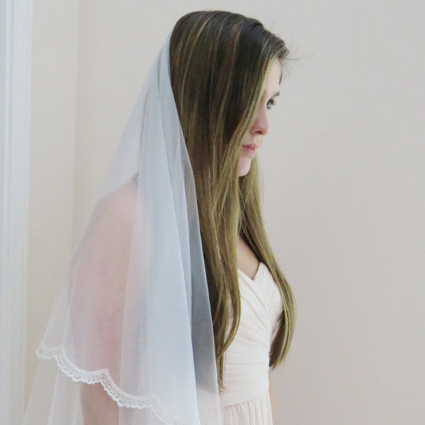 beaded mantilla veil scalloped lace trim cathedral length with blusher pulled back