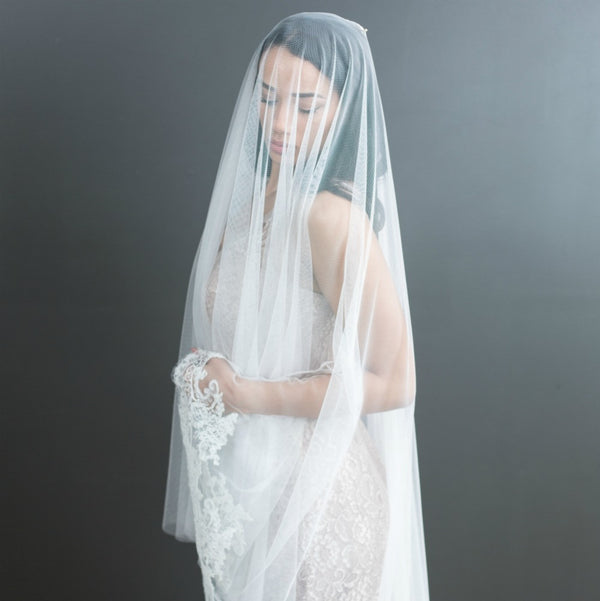 half-lace mantilla veil with blusher over face